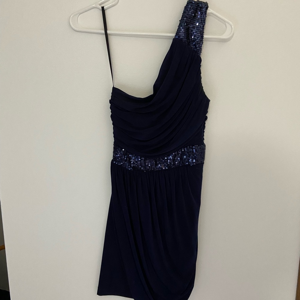 B. Smart going out dress. Sequin and ruching detail.